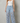 Solérine – Floral lace overlay – Wide-leg denim jeans
