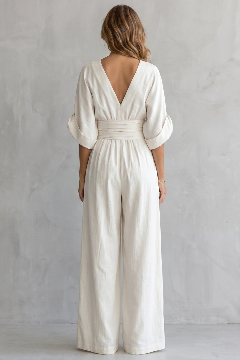 Valoria – Draped waist elegance – Wide-leg jumpsuit